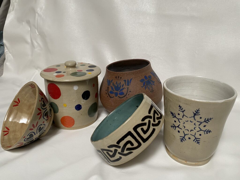 Various handmade pottery pieces finished with various glazing techniques and designs.